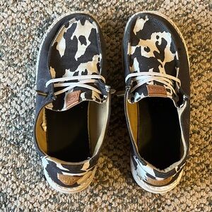 Cow print Hey Dude slip on loafers